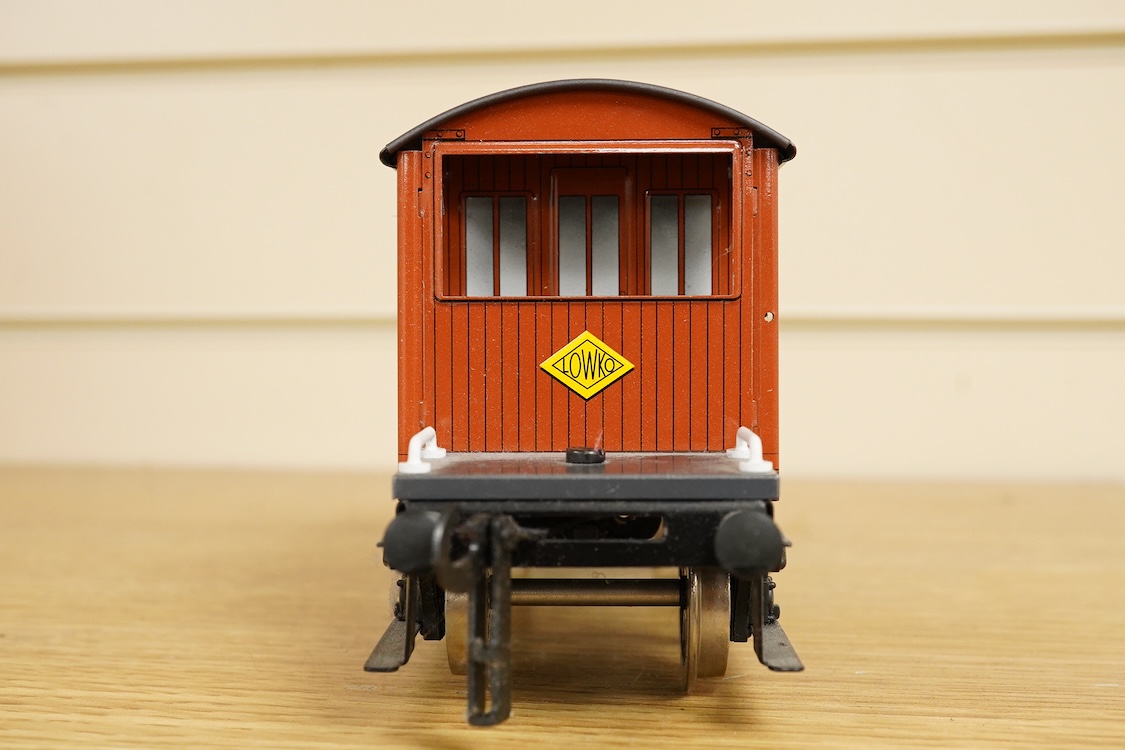 Four boxed Bassett-Lowke by Corgi 0 gauge railway freight wagons; a BR 20-ton brake van, together with two Southern Railways open wagons and a ventilated box van, together with a boxed Tenmille Products kit for a Talylly